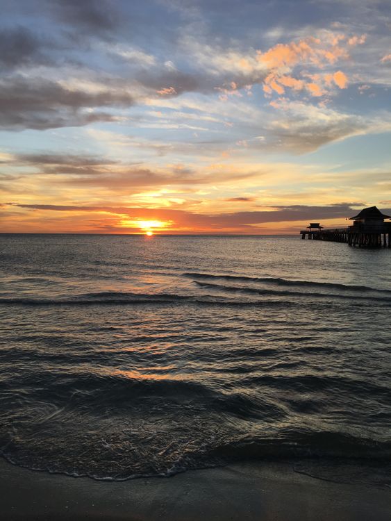 Naples Pier at sunset over the Gulf of Mexico